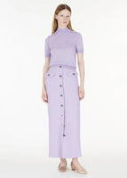 Full body of model wearing the Dakota Skirt in Wool Crepe in Lavender with the Mockneck Top in Ultra-Fine Cashmere Lavender