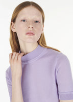Close up of model wearing the Mockneck Top in Ultra-Fine Cashmere Lavender