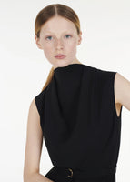 Close up of model wearing the Blythe Jumpsuit in Silk Crepe in Black.