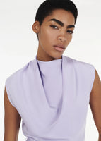 Close up shot of model wearing the Blythe Jumpsuit in Silk Crepe in Lavender.