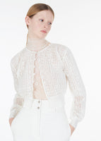 Model wearing the malone cardigan in pleated lace knit