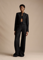 Model is wearing the Embroidered Bolero in Radzimir Wool with the Embroidered Deeda Pant in Radzimir Wool.