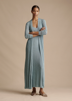 A model wearing the Long Cardigan in Metallic Rib open, paired with the Astrid Dress in Metallic Rib.