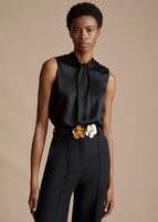 Model wearing the Draped Neck Shell in Silk Charmeuse with the Double Rose Flower Belt and Deeda Pant in Silk Wool.