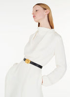Model wearing the knot buckle belt with the blythe dress in silk crepe in ivory