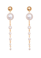 A set of pearl string earrings. 
