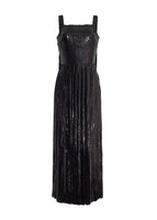 A flat lay of a black sequin dress. 