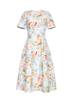 A flat lay of a pale blue floral short sleeve dress. 