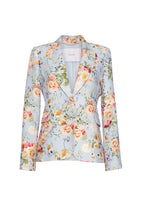 A flat lay of a pale blue floral blazer. 