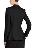 A back view image of a model wearing a black, double breasted blazer. 