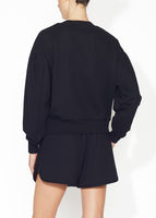 A back view of a black sweatshirt.