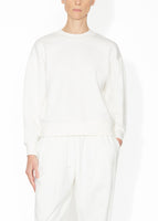 A front view of a ivory sweatshirt.