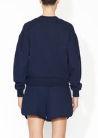 A back view of a navy sweatshirt.