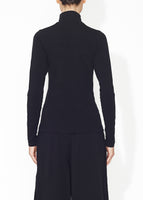 A back view of a black turtleneck.